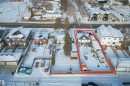 Snowy aerial view with property boundaries highlighted and a residential view - 15331 95 Avenue, Edmonton, AB  - Outdoor With View 