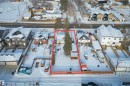 Snowy aerial view with property boundaries highlighted and a residential view - 15401 95 Avenue, Edmonton, AB  - Outdoor With View 