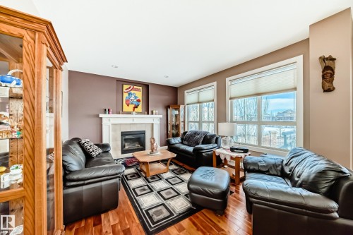 127 Keyport Circle, Leduc, AB - Indoor Photo Showing Living Room With Fireplace