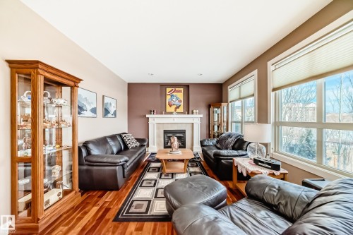 127 Keyport Circle, Leduc, AB - Indoor Photo Showing Living Room With Fireplace
