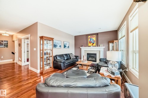 127 Keyport Circle, Leduc, AB - Indoor Photo Showing Living Room With Fireplace
