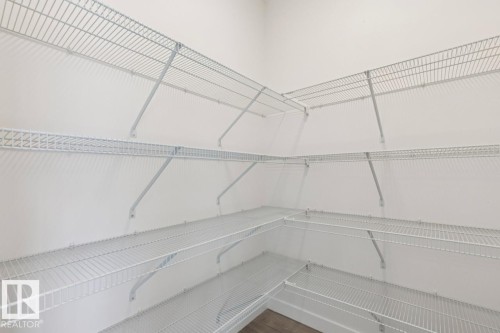 245 Wattle Road, Leduc, AB - Indoor With Storage