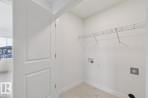 245 Wattle Road, Leduc, AB - Indoor With Storage