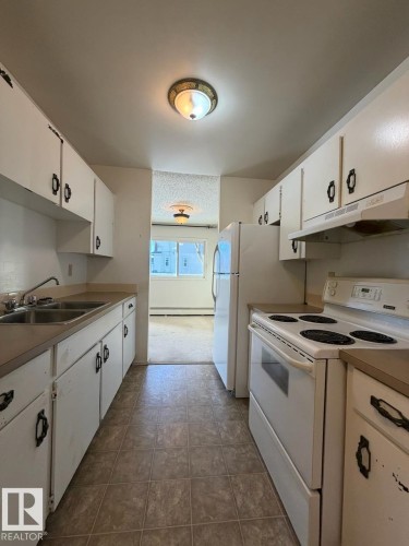 201 10111 160 Street, Edmonton, AB - Indoor Photo Showing Kitchen With Double Sink
