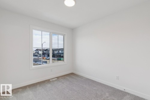 205 Wattle Road, Leduc, AB - Indoor Photo Showing Other Room