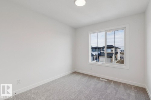 205 Wattle Road, Leduc, AB - Indoor Photo Showing Other Room