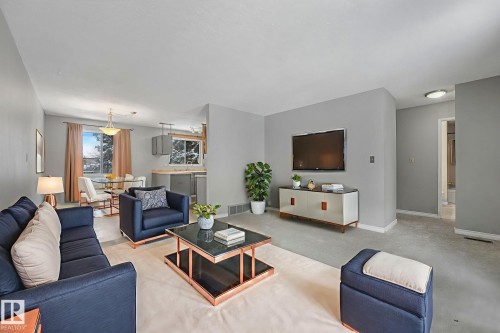 6411 12 Avenue, Edmonton, AB - Indoor Photo Showing Living Room