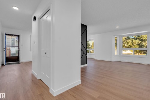 Corridor featuring recessed lighting and light wood-style flooring - 1111 49A Street, Edmonton, AB - Indoor