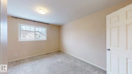116 230 Edwards Drive, Edmonton, AB - Indoor Photo Showing Other Room