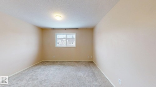 116 230 Edwards Drive, Edmonton, AB - Indoor Photo Showing Other Room