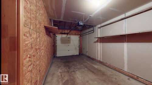 116 230 Edwards Drive, Edmonton, AB - Indoor Photo Showing Garage