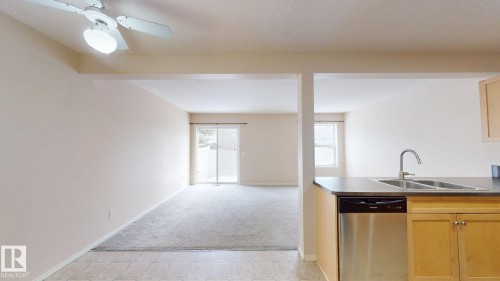 116 230 Edwards Drive, Edmonton, AB - Indoor Photo Showing Kitchen With Double Sink