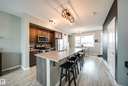 124 Southfork Road, Leduc, AB - Indoor Photo Showing Kitchen With Double Sink