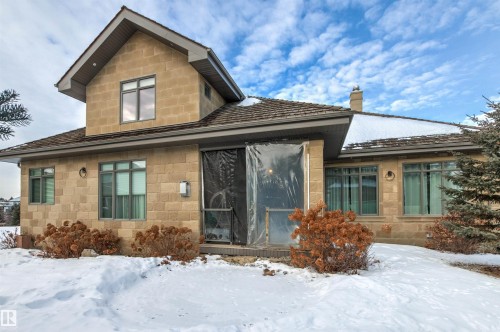 Snow covered property featuring a chimney - 2796 Wheaton Drive, Edmonton, AB - Outdoor