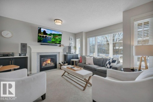 2464 Austin Crescent, Edmonton, AB - Indoor Photo Showing Living Room With Fireplace