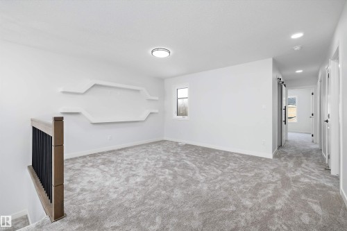 Spare room with light carpet and recessed lighting - 230 Edgemont Green Green Nw, Edmonton, AB - Indoor Photo Showing Other Room