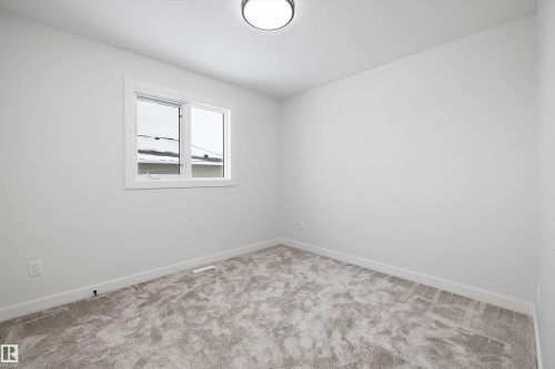 Spare room with baseboards and carpet floors - 230 Edgemont Green Green Nw, Edmonton, AB - Indoor Photo Showing Other Room