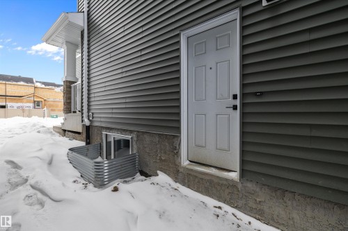 View of snow covered property entrance - 230 Edgemont Green Green Nw, Edmonton, AB - Outdoor