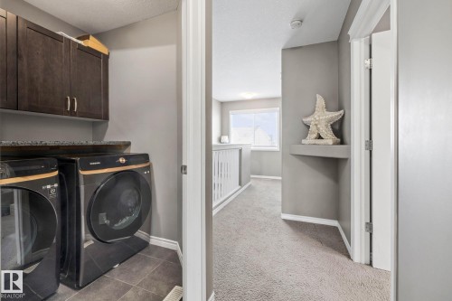 7020 22 Avenue Sw, Edmonton, AB - Indoor Photo Showing Laundry Room