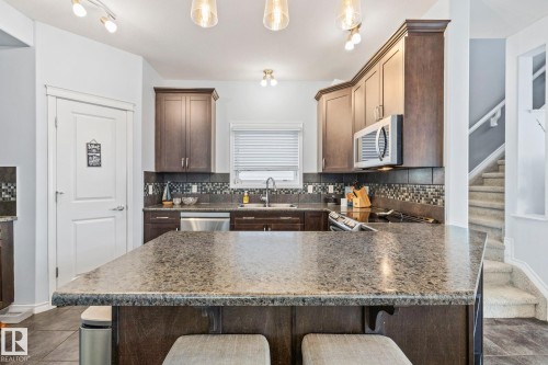 7020 22 Avenue Sw, Edmonton, AB - Indoor Photo Showing Kitchen With Double Sink With Upgraded Kitchen