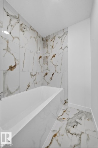 Bathroom with marble finish floors and baseboards - 12919 113A Street, Edmonton, AB - Indoor Photo Showing Bathroom