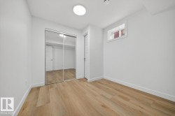 Unfurnished bedroom with light wood-type flooring and a closet - 