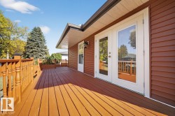 Deck featuring french doors - 