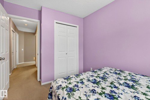 108 150 Edwards Drive, Edmonton, AB - Indoor Photo Showing Bedroom