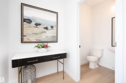 Half bath featuring light wood-type flooring - 