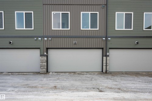 View of garage - 64 18120 28 Avenue Sw, Edmonton, AB - Outdoor With Exterior