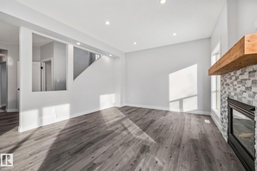 69 Hamilton Crescent, St. Albert, AB - Indoor Photo Showing Other Room With Fireplace