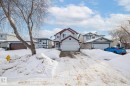 View of front of home featuring a garage and a residential view - 69 Hamilton Crescent, St. Albert, AB  - Outdoor With Facade 