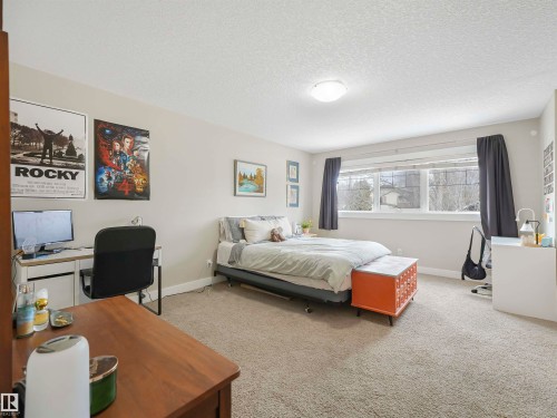 10941/10943 76 Avenue, Edmonton, AB - Indoor Photo Showing Bedroom