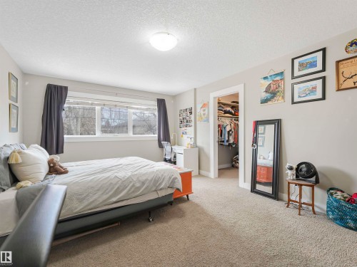 10941/10943 76 Avenue, Edmonton, AB - Indoor Photo Showing Bedroom