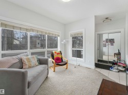 Thoughtful living room space upon entry, great for a craft room, sitting area - or a great home office space. - 