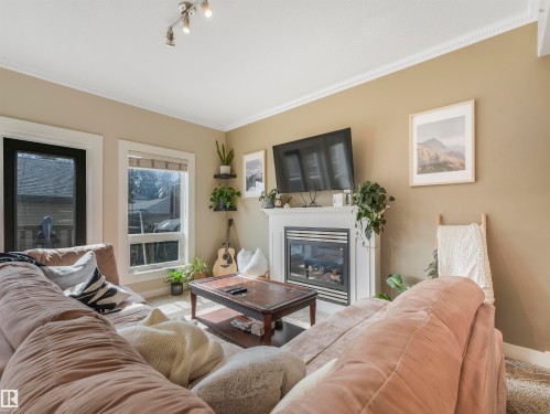 10943 76 Avenue, Edmonton, AB - Indoor Photo Showing Living Room With Fireplace