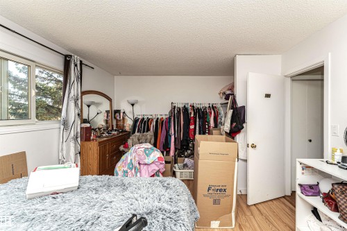 Spacious closet featuring light wood finished floors - 2349 Millbourne Road W, Edmonton, AB - Indoor