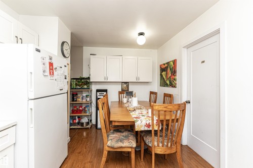 Dining space featuring dark wood-type flooring - 2349 Millbourne Road W, Edmonton, AB - Indoor Photo Showing Dining Room