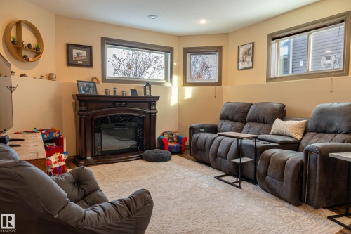 1509 14 Avenue, Cold Lake, AB - Indoor Photo Showing Living Room With Fireplace