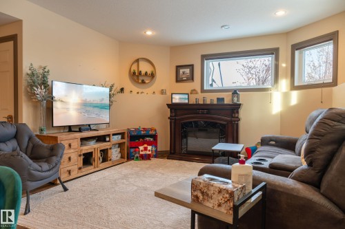 1509 14 Avenue, Cold Lake, AB - Indoor Photo Showing Living Room With Fireplace