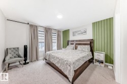 Carpeted bedroom with baseboards - 