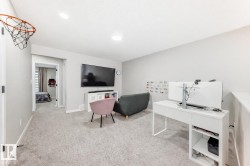 Carpeted office with baseboards - 