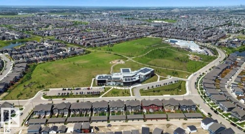 Aerial view of property and surrounding area with nearby suburban area - 4930 Hawthorn Place, Edmonton, AB - 
