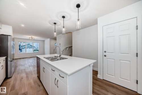 4619 177Ave, Edmonton, AB - Indoor Photo Showing Kitchen With Double Sink