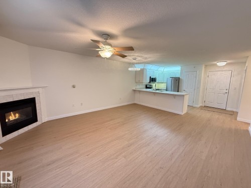 422 6703 172 Street, Edmonton, AB - Indoor Photo Showing Living Room With Fireplace