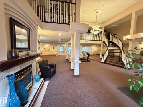 422 6703 172 Street, Edmonton, AB - Indoor Photo Showing Other Room With Fireplace