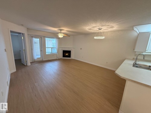 422 6703 172 Street, Edmonton, AB - Indoor Photo Showing Other Room With Fireplace