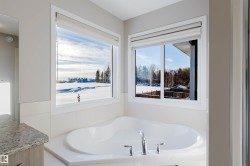 Full bathroom featuring a bath and vanity - 
