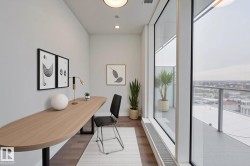 Office area with dark wood-style flooring, floor to ceiling windows, and recessed lighting - 