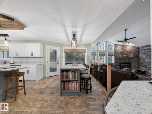 230 51350 Rge Rd 224, Rural Strathcona County, AB - Indoor With Fireplace